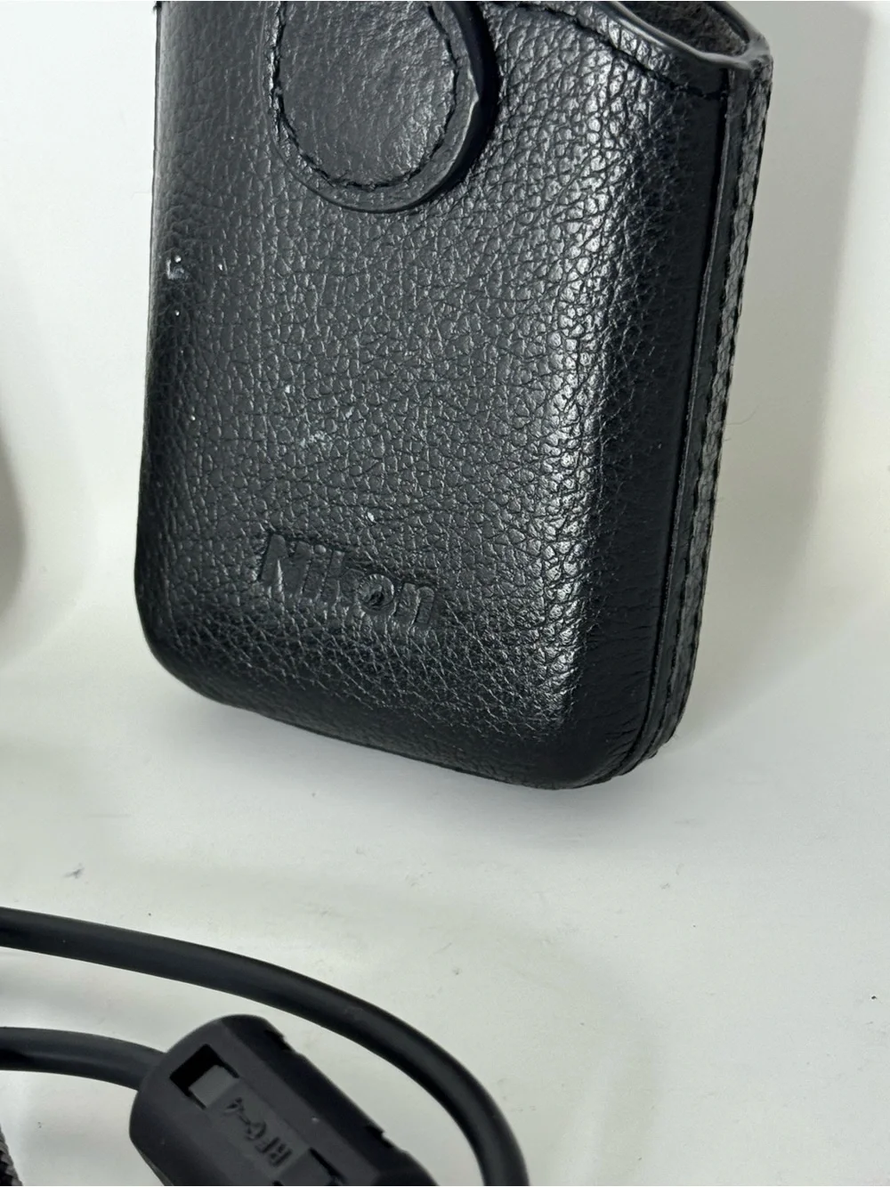 Nikon COOLPIX Silver Point-and-Shoot Camera with Black Case with charger cable